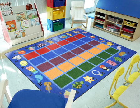 Alphabet Phonics 7'8" x 10'9" area rug in color Blue